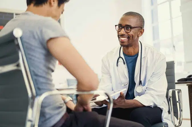 A doctor attending to a patient