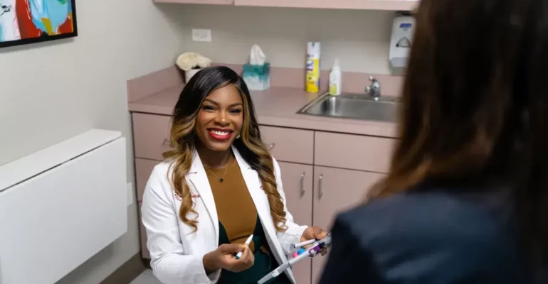 A primary care physcian attending to a patient.