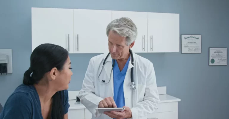A doctor attending to a patient
