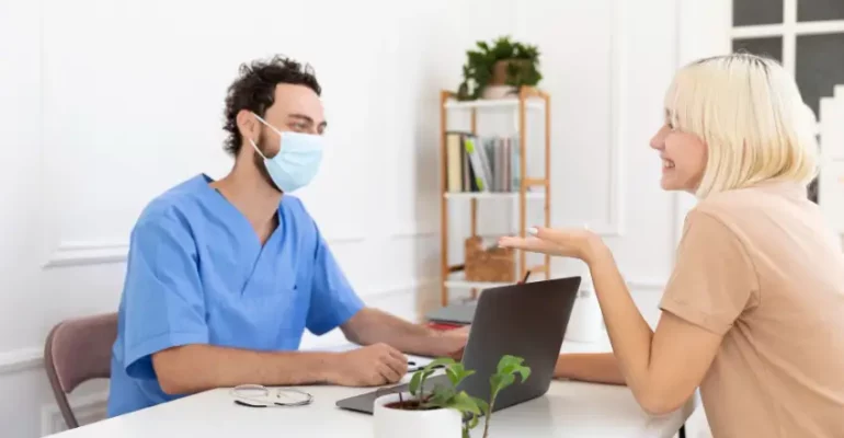 Primary Care Doctor with a patient